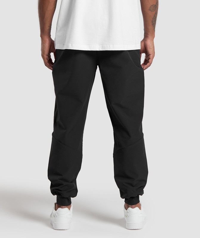 Gymshark Ease Woven Joggers Joggingbroek Heren Zwart | ISDB69325