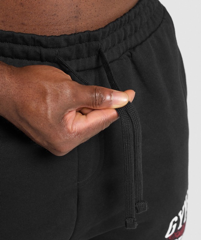 Gymshark Trophy Graphic Joggers Joggingbroek Heren Zwart | FNXS04658